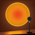 Sunset Projection Lamp – 16 color moods with a warm, dreamy glow. Adjustable, 180° rotating LED light that transforms any room into a cozy sunset vibe.
