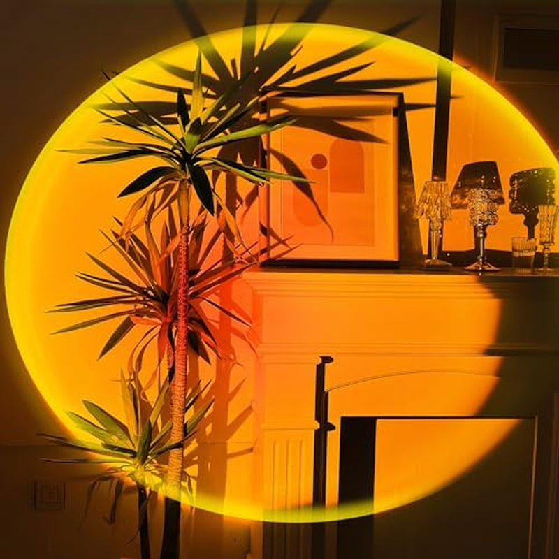 Sunset Projection Lamp – 16 color moods with a warm, dreamy glow. Adjustable, 180° rotating LED light that transforms any room into a cozy sunset vibe.